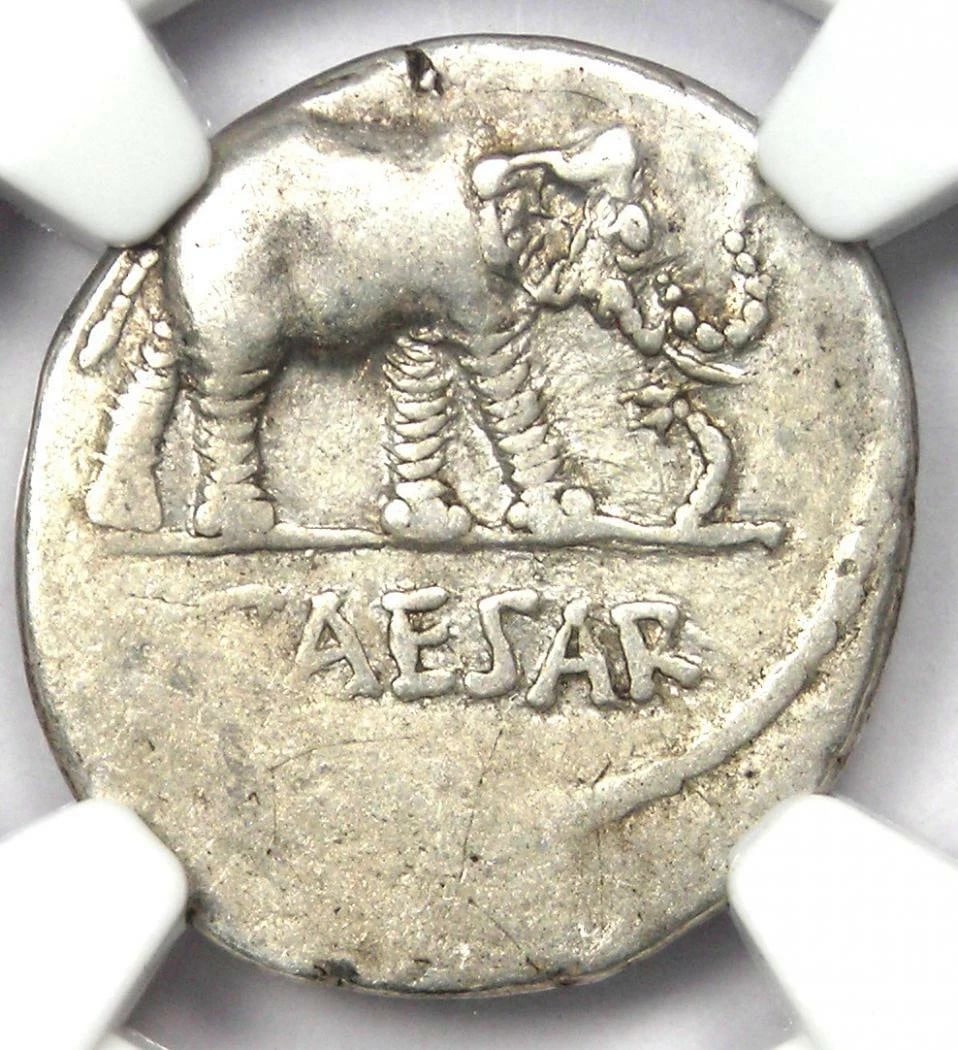 JULIUS CAESAR AR DENARIUS SILVER ELEPHANT COIN: Julius Caesar AR Denarius Silver Elephant Coin Year: 49 BC Denomination: Denarius Composition: Silver Country of Origin: Italy Accessories: None Accessories Notice: When purchasing pre-own