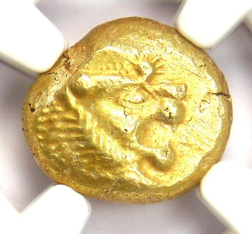 LYDIA ELECTRUM LION EL THIRD STATER TRITE COIN: Lydia Electrum Lion EL Third Stater Trite Coin Year: 610 BC Denomination: Third Stater Composition: Electrum Country of Origin: Greece Accessories: None Accessories Notice: When purchasing