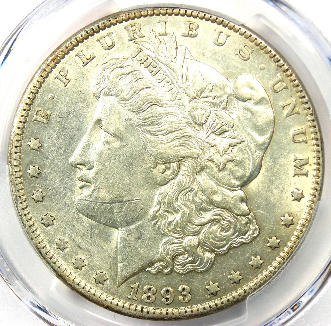 1893 MORGAN SILVER DOLLAR $1 COIN: 1893 Morgan Silver Dollar $1 Coin Year: 1893 Denomination: $1 Composition: Silver Country of Origin: United States Accessories: None Accessories Notice: When purchasing pre-owned goods, pl