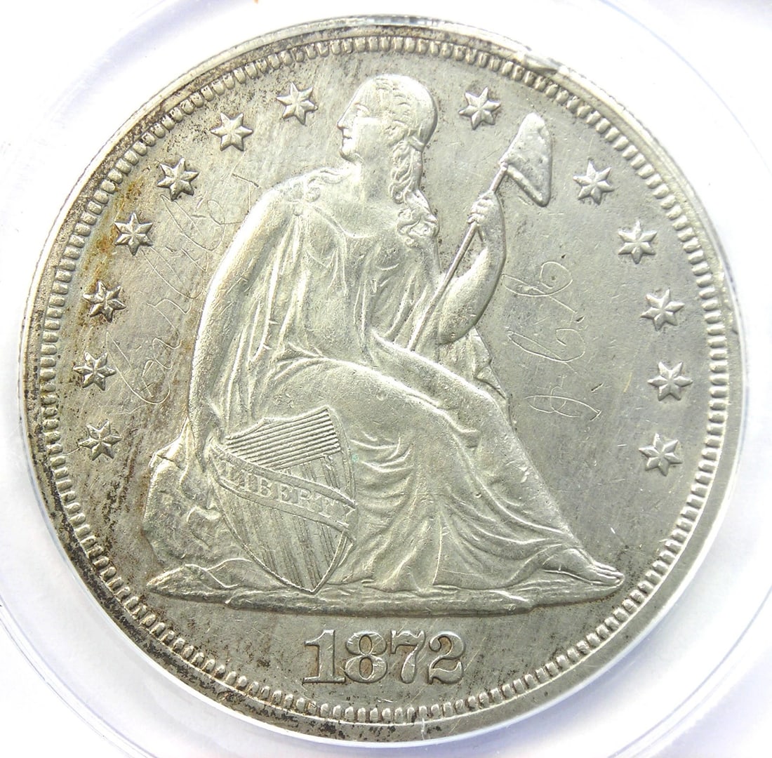 1872 SEATED LIBERTY SILVER DOLLAR $1 COIN: 1872 Seated Liberty Silver Dollar $1 Coin Year: 1872 Denomination: $1 Composition: Silver Country of Origin: United States Accessories: None Accessories Notice: When purchasing pre-owned g