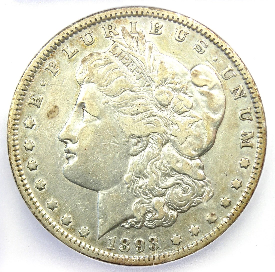 1893 MORGAN SILVER DOLLAR $1 COIN: 1893 Morgan Silver Dollar $1 Coin Year: 1893 Denomination: $1 Composition: Silver Country of Origin: United States Accessories: None Accessories Notice: When purchasing pre-owned goods, please refer