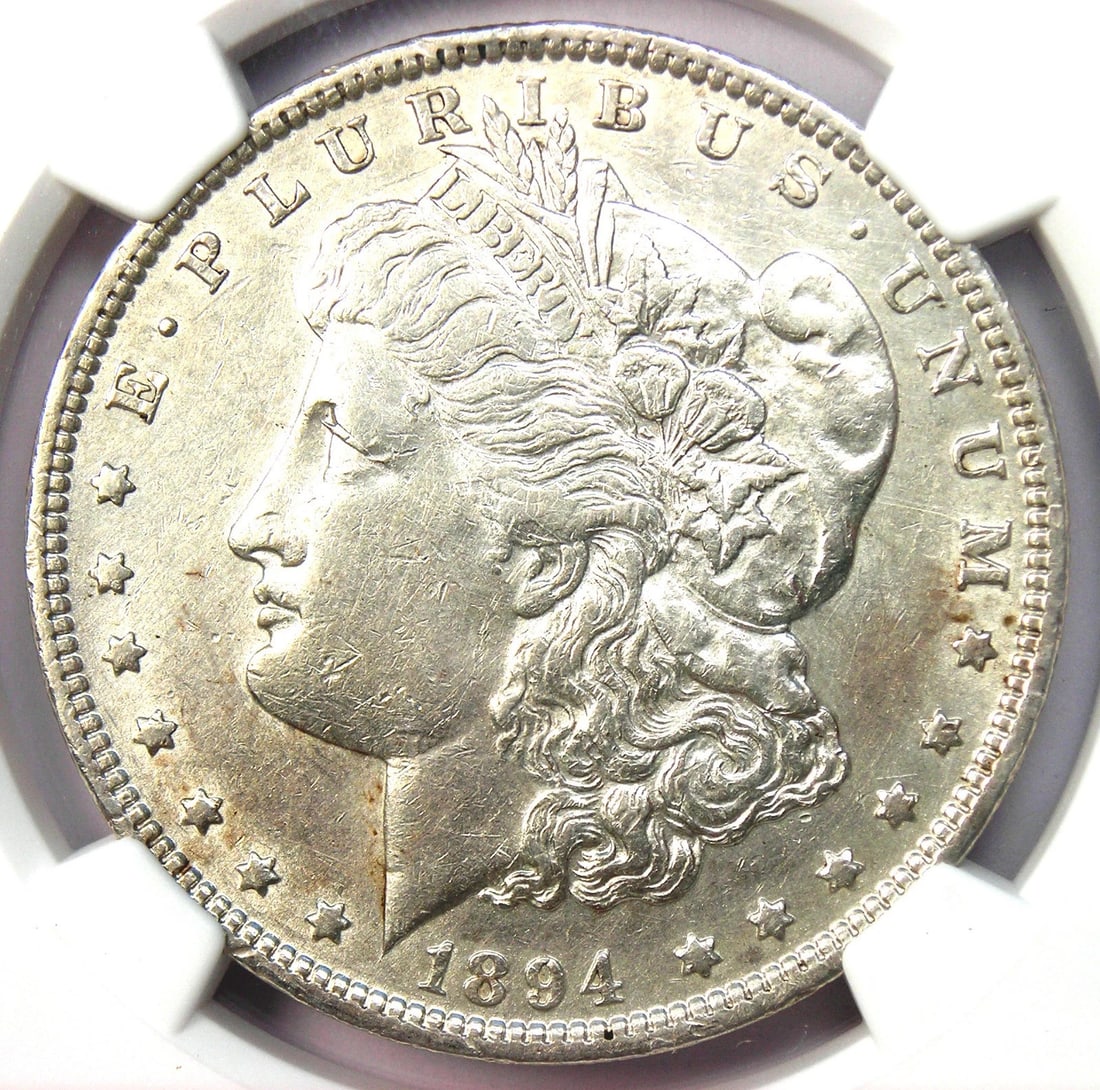 1894-P MORGAN SILVER DOLLAR $1 COIN 1894: 1894-P Morgan Silver Dollar $1 Coin 1894 Year: 1894 Denomination: $1 Composition: Silver Country of Origin: United States Accessories: None Accessories Notice: When purchasing pre-owned goods, please