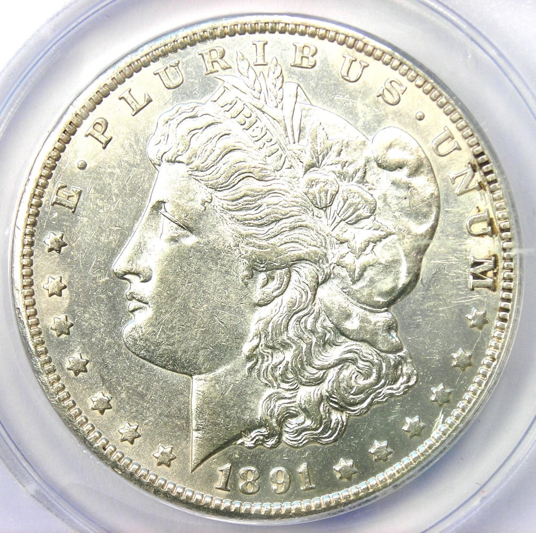1891-CC MORGAN DOLLAR $1 CARSON CITY RARE COIN: 1891-CC Morgan Dollar $1 Carson City Rare Coin Year: 1891 Denomination: $1 Composition: Silver Country of Origin: United States Accessories: None Accessories Notice: When purchasing pre-ow