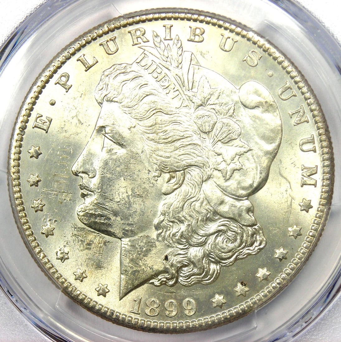 1899-S MORGAN SILVER DOLLAR $1 COIN: 1899-S Morgan Silver Dollar $1 Coin Year: 1899 Denomination: $1 Composition: Silver Country of Origin: United States Accessories: None Accessories Notice: When purchasing pre-owned goods,