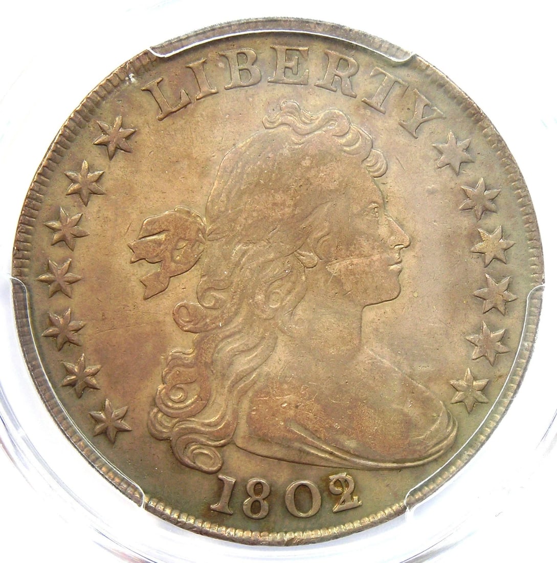 1802/1 DRAPED BUST SILVER DOLLAR $1 WIDE DATE COIN: 1802/1 Draped Bust Silver Dollar $1 Wide Date Coin Year: 1802 Denomination: $1 Composition: Silver Country of Origin: United States Accessories: None Accessories Notice: When purchasing pr