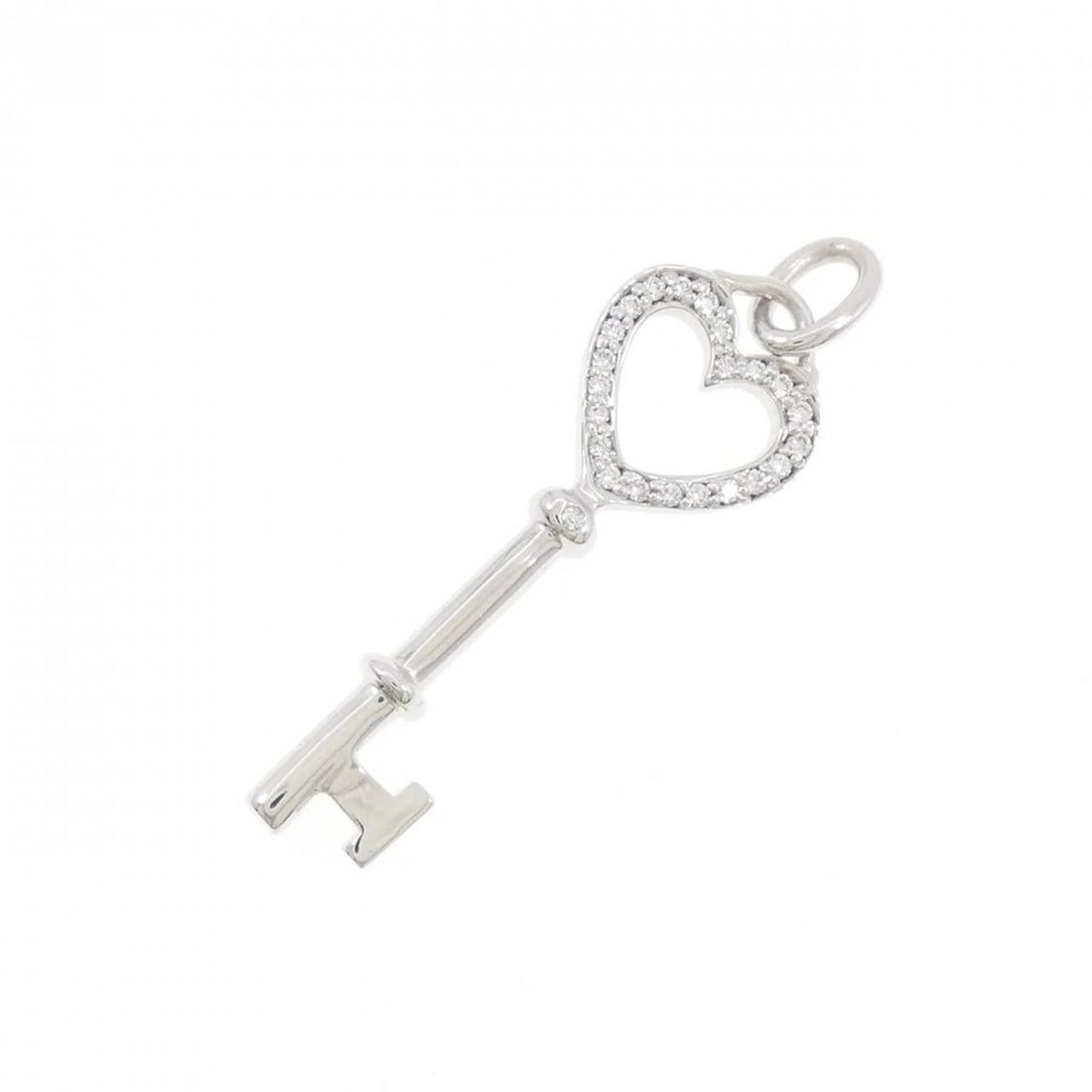 TIFFANY&CO. HEART KEY MINI PENDANT: TIFFANY&Co. Heart Key Mini Pendant Brand: TIFFANY&Co. Type/Style: TIFFANY&Co. Pendant/Brooch Material: 750 white gold, Main Stone Natural Color: White Gold Size: Actual Size Approximate dimensions