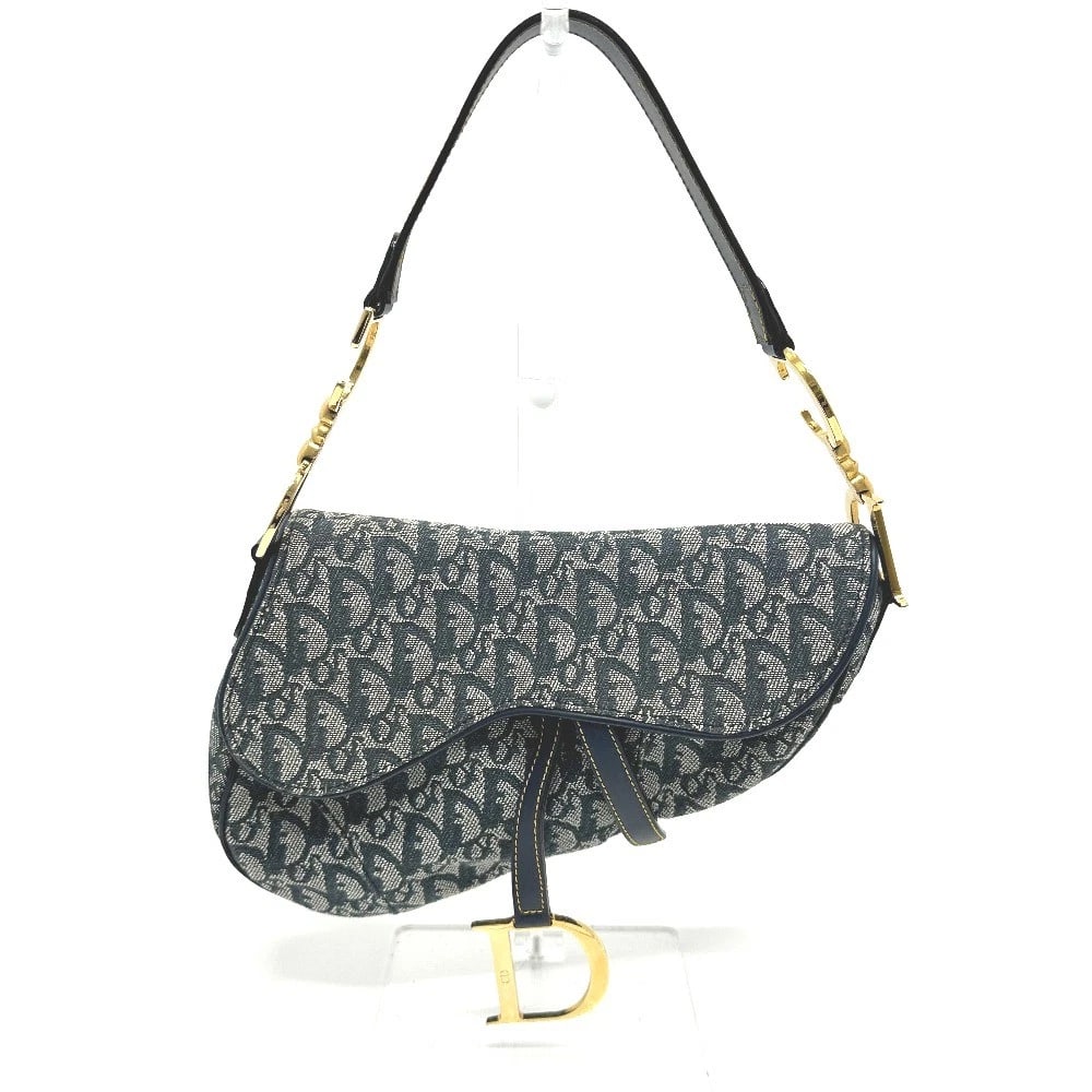 CHRISTIAN DIOR TROTTER OBLIQUE SADDLEBAG BAG: Christian Dior Trotter Oblique Saddlebag bag Brand: Christian Dior Type/Style: Shoulder Bag Material: Canvas/Leather Color: NavyxMetal fittingsGold Size: W11.8xH7.5xD1.2inch / W30cmxH19cmxD3cm Acc