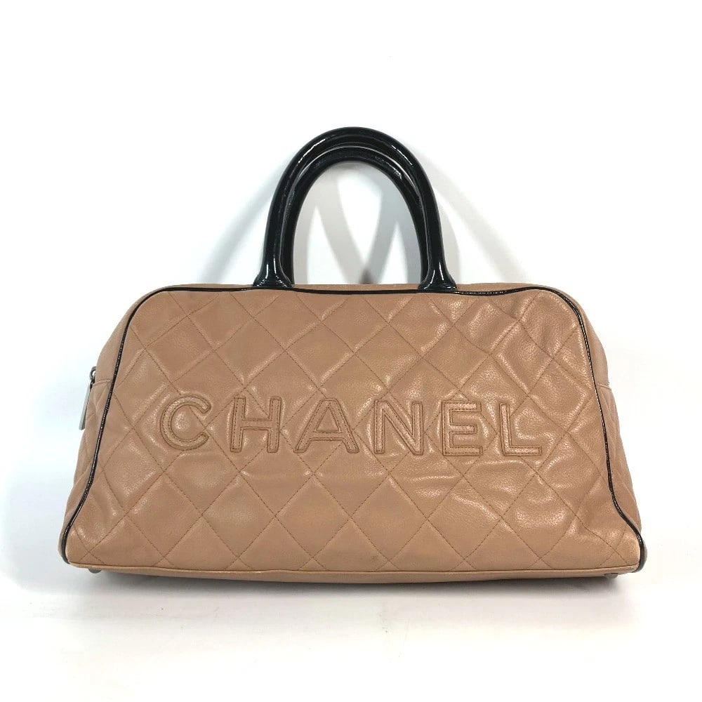 CHANEL SPORTS BAG LOGO QUILTED BAG HAND BAG: CHANEL Sports bag Logo Quilted Bag Hand Bag Brand: CHANEL Type/Style: Duffle Bag Material: Caviar Leather Color: BeigeBasedxBlack Size: W14.2xH7.5xD3.9inch / W36cmxH19cmxD10cm Accessories: None