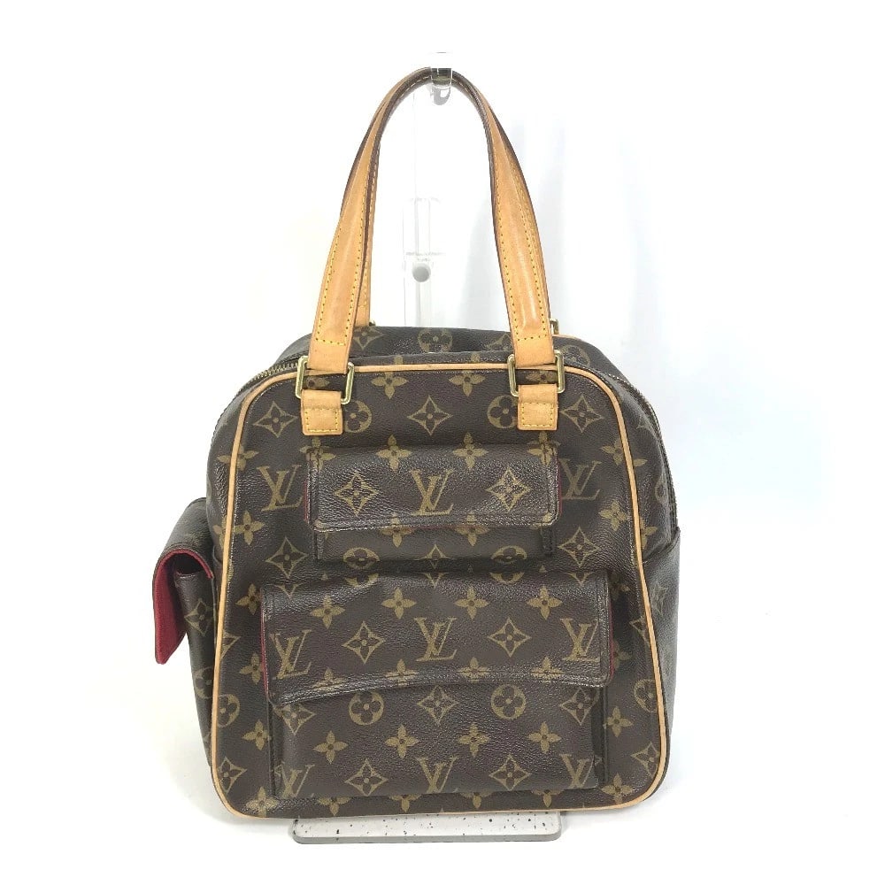 LOUIS VUITTON MONOGRAM EXCENTRI-CITE BAG HAND BAG: LOUIS VUITTON Monogram excentri-cite Bag Hand Bag Brand: LOUIS VUITTON Type/Style: Hand Bag Material: MonogramCanvas Color: Brown Size: W9.1xH9.6xD4.1inch / W23cmxH24.5cmxD10.5cm Accessories: None