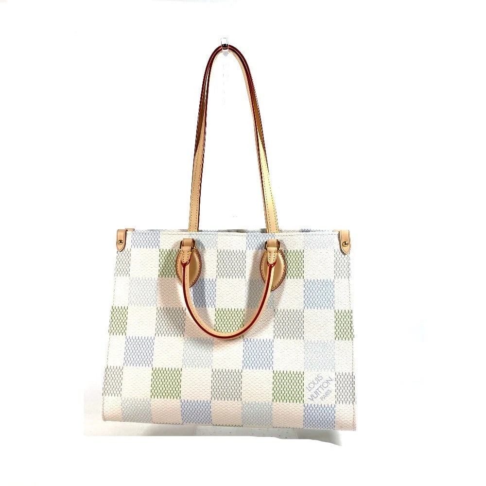 LOUIS VUITTON PASTEL DAMIER ON THE GO MM TOTE BAG: LOUIS VUITTON Pastel Damier On the Go MM Tote Bag Brand: LOUIS VUITTON Type/Style: Hand Bag Material: Damier Canvas Color: pistachio / White Size: W13.8xH10.6xD5.5inch / W35cmxH27cmxD14cm Accessor