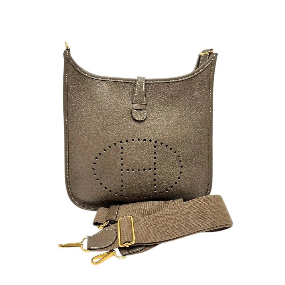 HERMES EVELYNE3PM TROYES CROSSBODY SHOULDER BAG: HERMES Evelyne3PM Troyes Crossbody Shoulder Bag Brand: HERMES Type/Style: Shoulder Bag Material: Taurillon Clemence Color: Brown Size: W11.0xH10.2xD3.3inch / W28cmxH26cmxD8.5cm Accessories: None <
