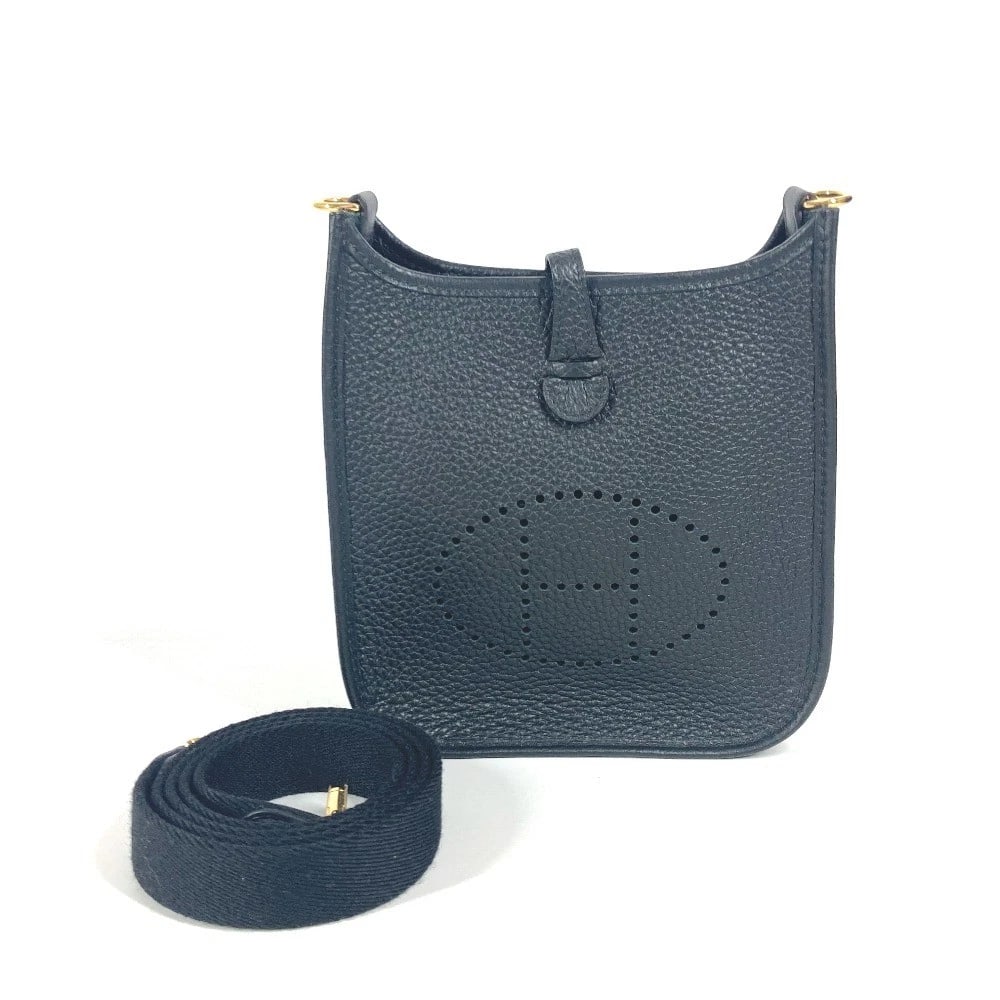HERMES LONG EVELYNE CROSSBODY POCHETTE BAG: HERMES long Evelyne Crossbody Pochette bag Brand: HERMES Type/Style: Shoulder Bag Material: Taurillon Clemence Color: Black Size: W6.5xH6.9xD2.2inch / W16.5cmxH17.5cmxD5.5cm Accessories: None