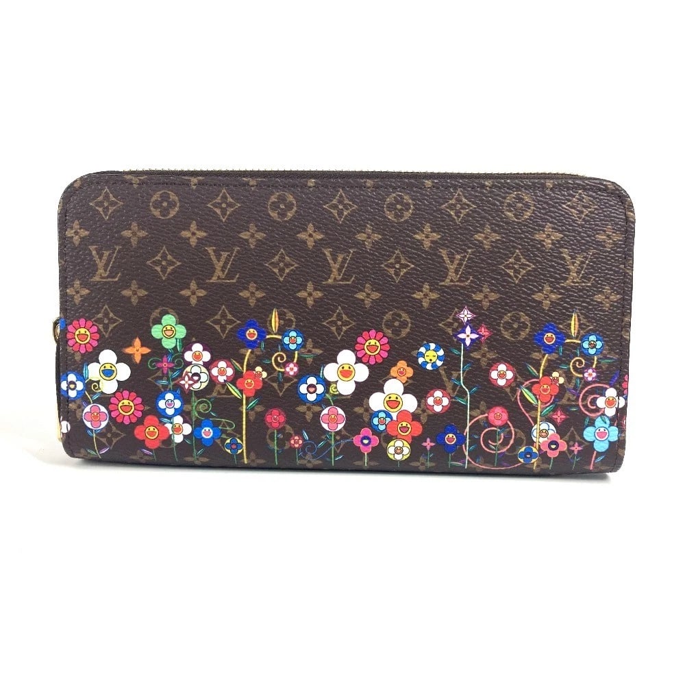 LOUIS VUITTON MONOGRAM TAKASHI MURAKAMI ZIPPY WALLET: LOUIS VUITTON Monogram Takashi Murakami Zippy Wallet Brand: LOUIS VUITTON Type/Style: Long Wallet Material: MonogramCanvas Color: Brown Size: W7.7xH4.1inch / W19.5cmxH10.5cm Accessories: None