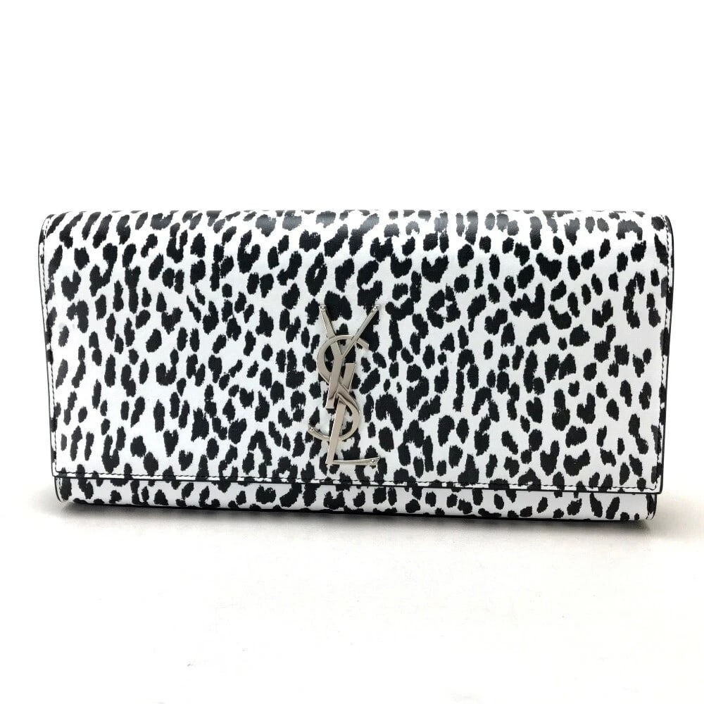 SAINT LAURENT PARIS CASSANDRA LEOPARD PARTY BAG: SAINT LAURENT PARIS Cassandra Leopard Party Bag Brand: SAINT LAURENT PARIS Type/Style: Clutch bag Material: Calf leather Color: White / BlackxWhite/SilverHardware Size: W10.6xH5.1xD1.6inch / W27cmxH13