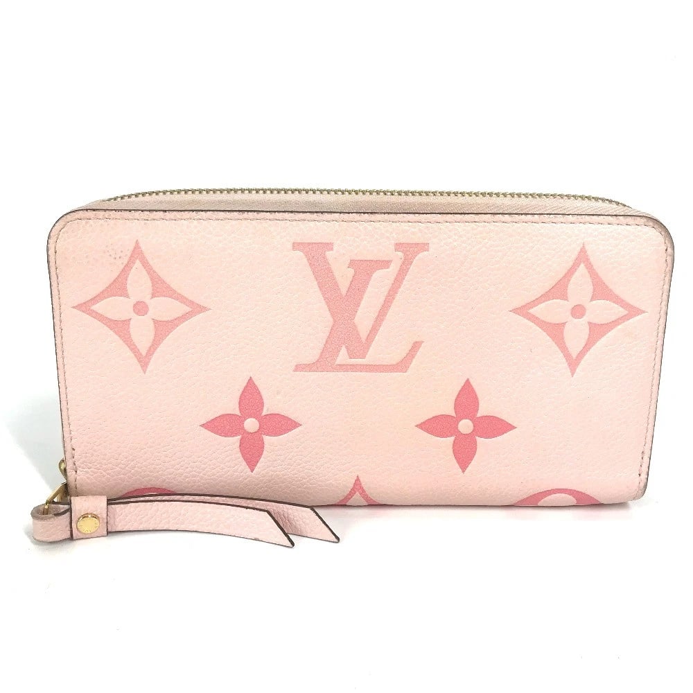LOUIS VUITTON MONOGRAMEMPREINTE LONG WALLET: LOUIS VUITTON MonogramEmpreinte Long Wallet Brand: LOUIS VUITTON Type/Style: Long Wallet Material: MonogramEmpreinteLeather Color: Buton de Rose / pink Size: W7.7xH3.9inch / W19.5cmxH10cm Accessor