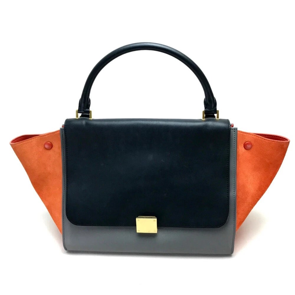 CELINE 2WAYHAND BAG TRAPEZE SHOULDER BAG GRAY X BLACK X ORANGE: CELINE 2WAYHand Bag Trapeze Shoulder bag Gray x Black x Orange Brand: CELINE Type/Style: Shoulder Bag Material: Suede x Leather Color: Black / Gray x Black x Orange Size: W11.8 x H9.6 x D5.9inch / W30