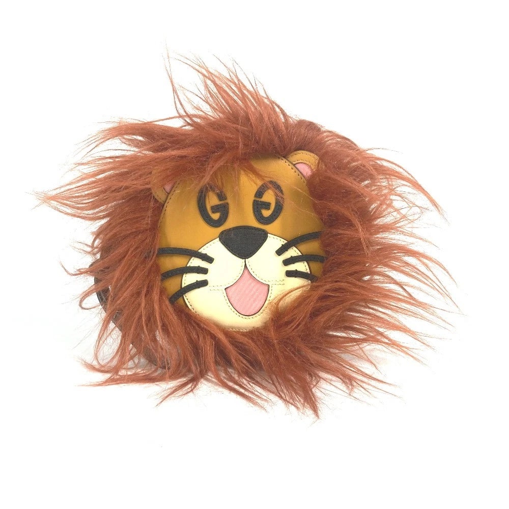 GUCCI GG LION LION ROUND POUCH WITH BAG STRAP CLUTCH BAG: GUCCI GG Lion Lion Round Pouch with bag strap Clutch bag Brand: GUCCI Type/Style: Clutch bag Material: fur / Leather / suede Color: Brown Size: W6.7xH6.5xD1.8inch / W17cmxH16.5cmxD4.5cm Accessorie