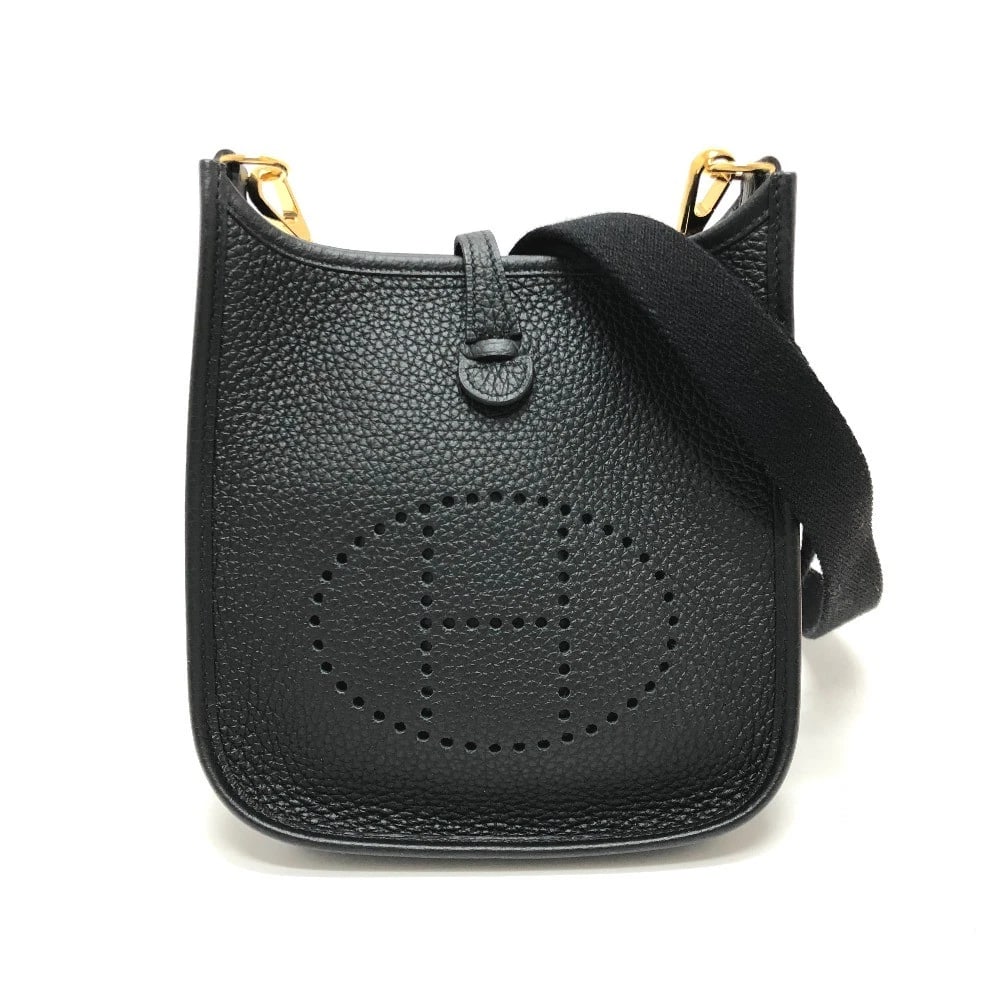 HERMES EVELYNE TPM POCHETTE MINI BAG SHOULDER BAG: HERMES Evelyne TPM Pochette Mini Bag Shoulder Bag Brand: HERMES Type/Style: Shoulder Bag Material: Taurillon Clemence Color: BlackxGoldHardware Size: W6.9xH7.1xD2.0inch / W17.5cmxH18cmxD5cm Access