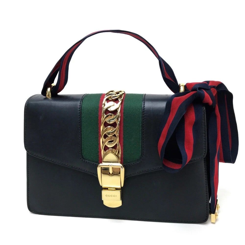 GUCCI LINE SILVI SMALL RIBBON SHOULDER BAG BLACK: GUCCI line Silvi Small Ribbon Shoulder Bag Black Brand: GUCCI Type/Style: Shoulder Bag Material: Leather Color: Black Size: W10.0xH6.7xD3.1inch / W25.5cmxH17cmxD8cm Accessories: None Acces