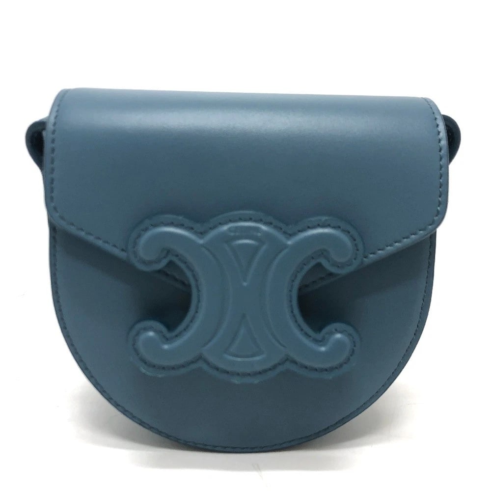 CELINE TRIOMPHE MINI BUZAS CUIR SHOULDER BAG: CELINE Triomphe Mini Buzas Cuir Shoulder Bag Brand: CELINE Type/Style: Shoulder Bag Material: Leather / Calf leather Color: blue Size: W4.3xH4.7xD2.2inch / W11cmxH12cmxD5.5cm Accessories: None