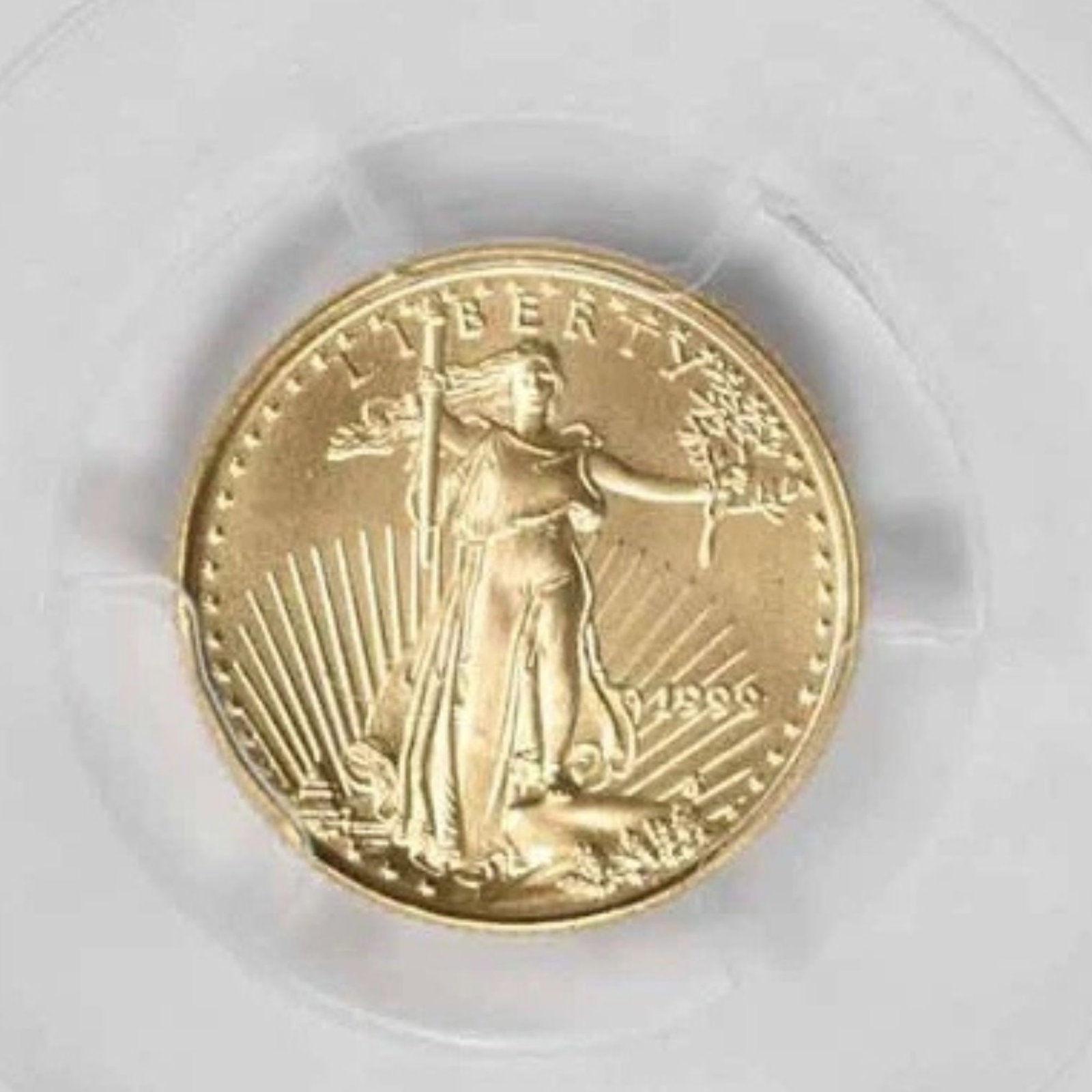 1999 $5 AMERICAN GOLD EAGLE: 1999 $5 American Gold Eagle Year: 1999 Composition: 91.67% Gold, 3% Silver, 5.33% Copper Denomination: Country of Origin: United States Accessories: None Accessories Notice: When purchasing pre-owned