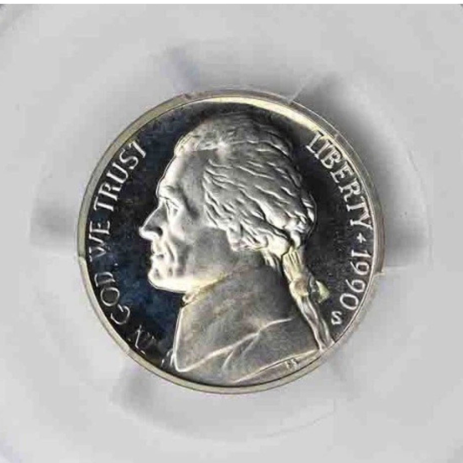 1990-S JEFFERSON NICKEL: 1990-S Jefferson Nickel Year: 1990 Composition: 75% Copper, 25% Nickel Denomination: 5C Country of Origin: United States Accessories: None Accessories Notice: When purchasing pre-owned goods, please