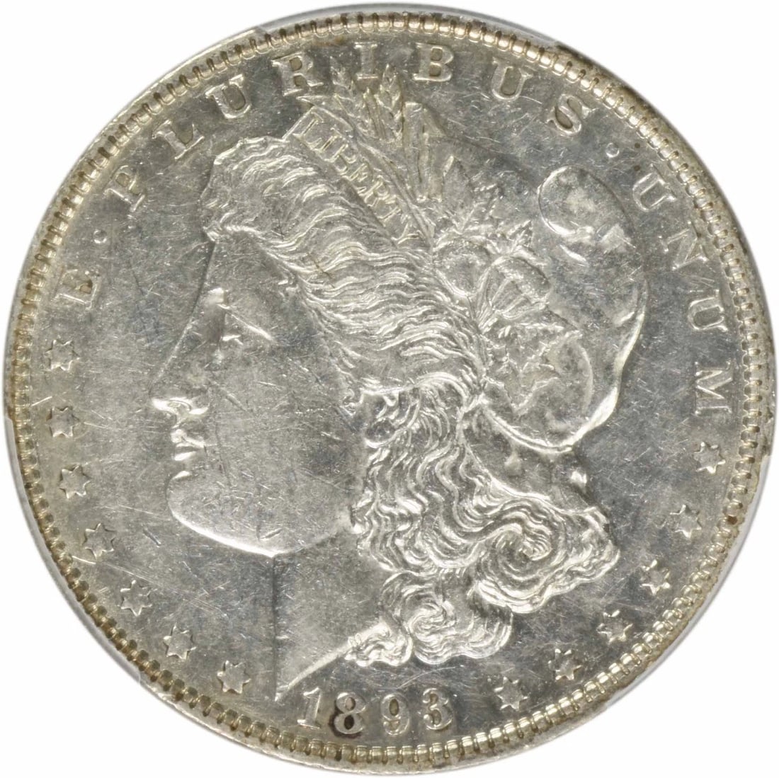 1893 MORGAN SILVER DOLLAR: 1893 Morgan Silver Dollar Year: 1893 Composition: 90% Silver, 10% Copper Denomination: $1 Country of Origin: United States Accessories: None Accessories Notice: When purchasing pre-owned goods,