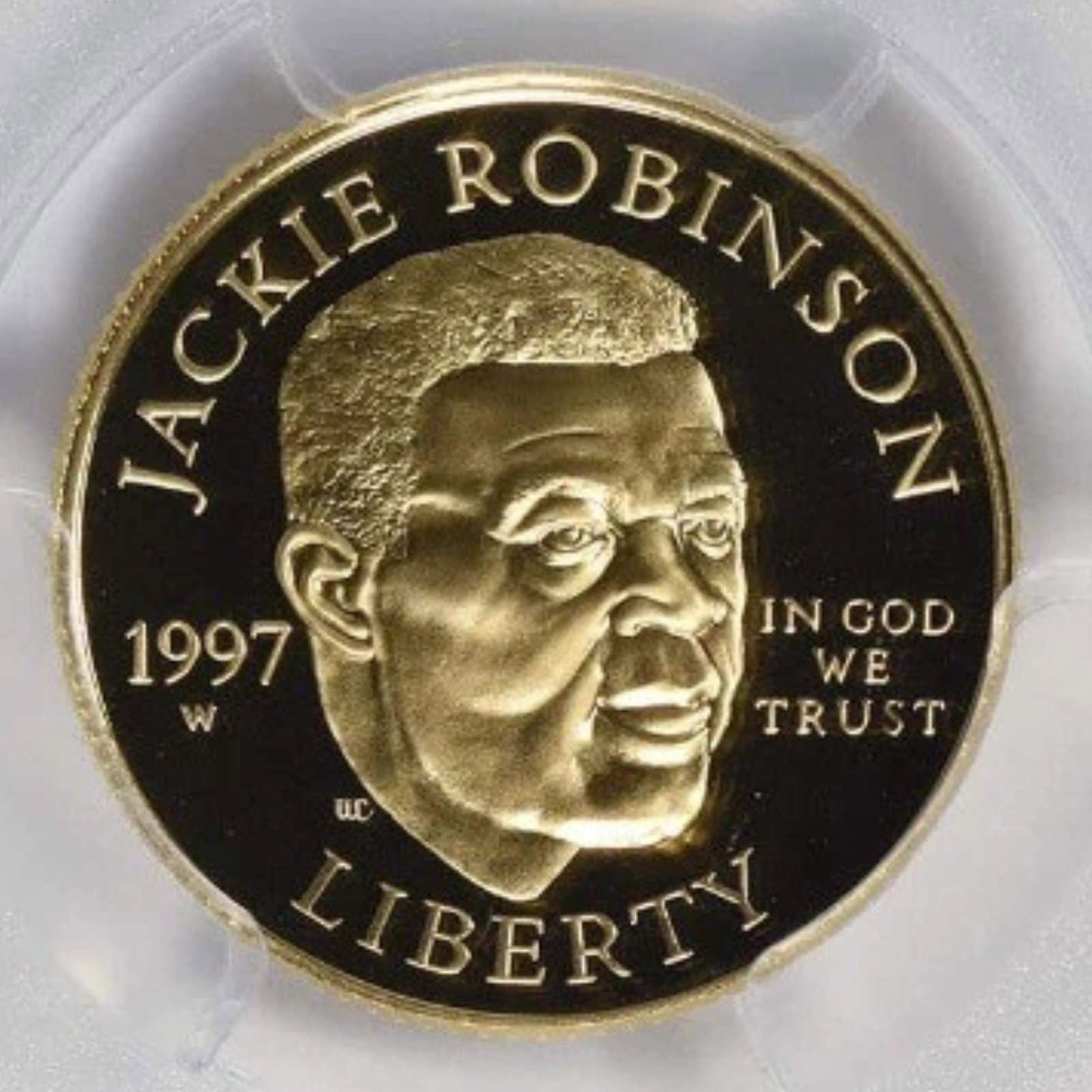 1997-W JACKIE ROBINSON COMMEMORATIVE $5 GOLD: 1997-W Jackie Robinson Commemorative $5 Gold Year: 1997 Composition: Gold Denomination: Five Dollar Country of Origin: United States Accessories: None Accessories Notice: When purchasing pre-owned