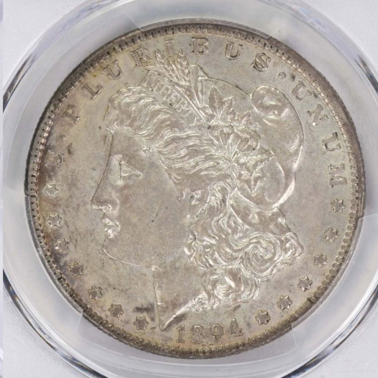 1894-O MORGAN SILVER DOLLAR: 1894-O Morgan Silver Dollar Year: 1894 Composition: 90% Silver, 10% Copper Denomination: $1 Country of Origin: United States Accessories: None Accessories Notice: When purchasing pre-owned goods,