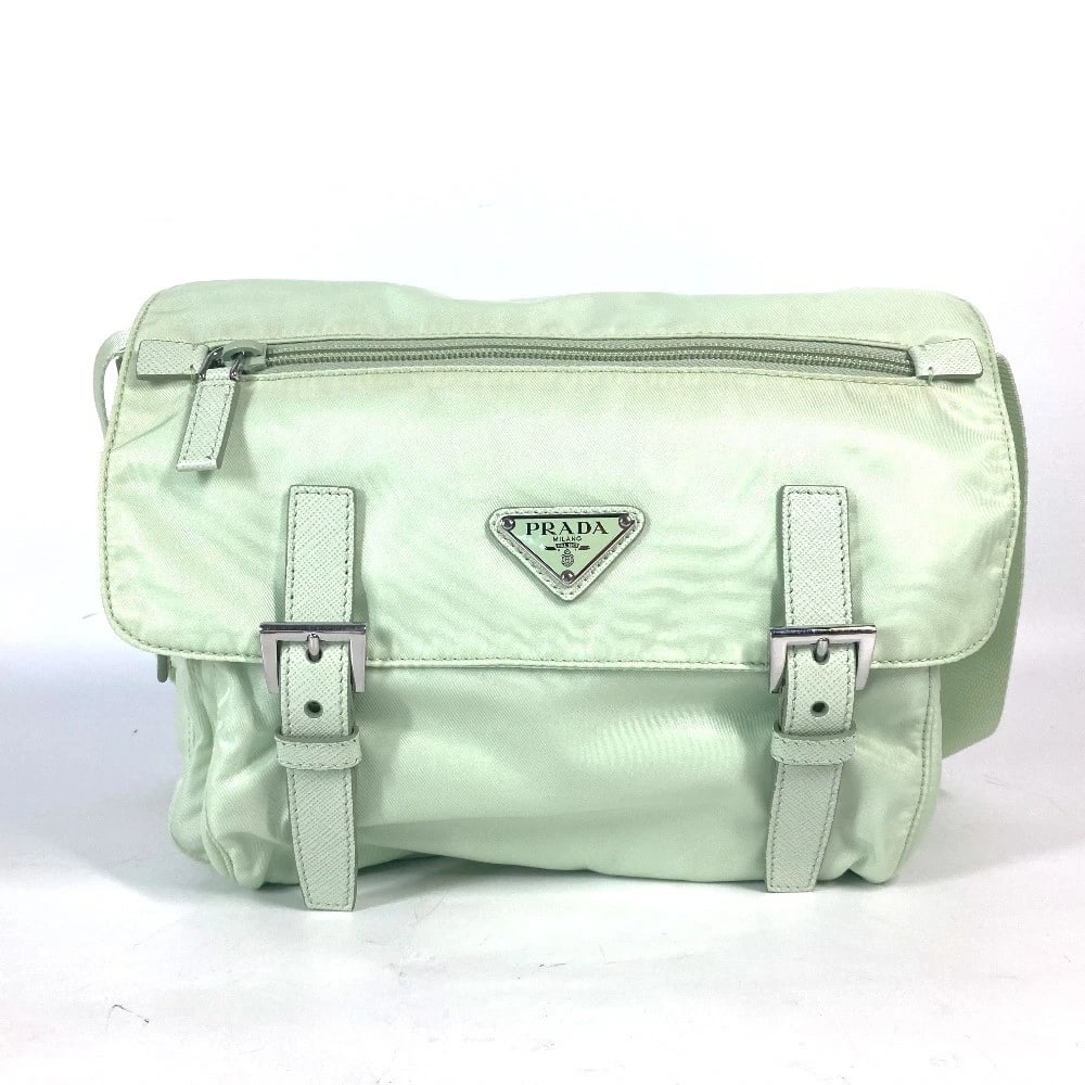 PRADA TRIANGLE LOGO PLATE RE-NYLON CROSSBODY SHOULDER BAG: PRADA triangle logo plate Re-Nylon Crossbody shoulder bag Brand: PRADA Type/Style: Shoulder Bag Material: Nylon Color: ACQUA / Green Size: W10.2xH8.1xD4.3inch / W26cmxH20.5cmxD11cm Accessories: No