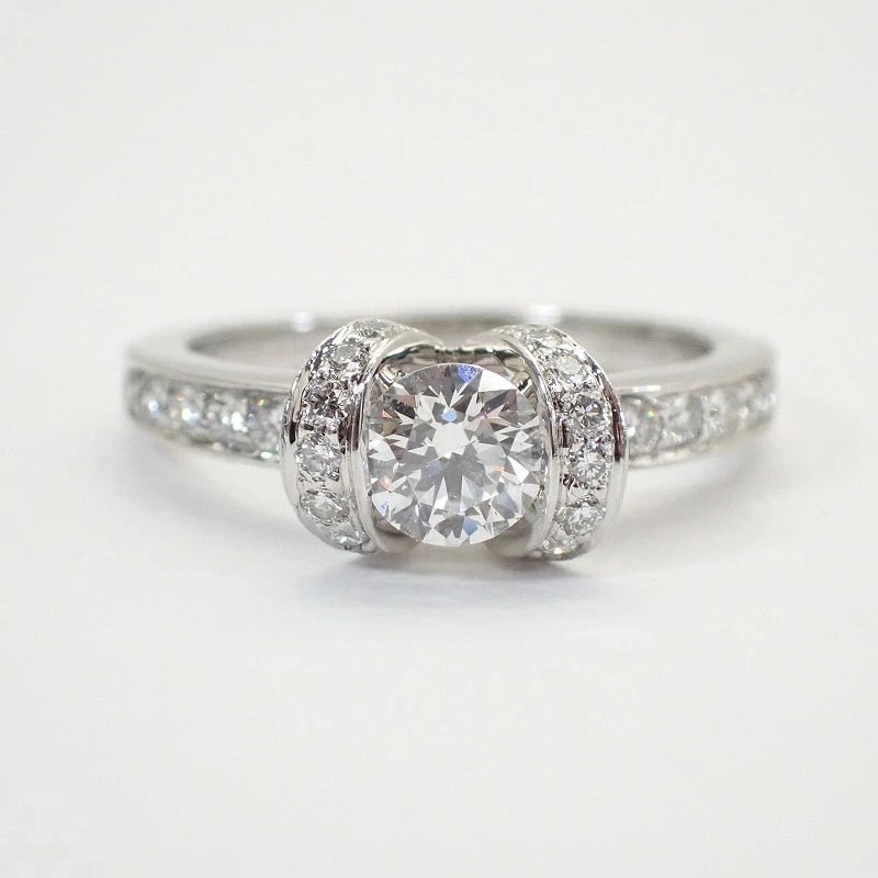 TIFFANY & CO. PT950 DIAMOND RIBBON RING: Tiffany & Co. Pt950 Diamond Ribbon Ring Brand: Tiffany & Co. Type/Style: Ring Material: Pt950, Main Stone Natural Color: Silver Size: US 5 Accessories: None Accessories Notice: When purchasing
