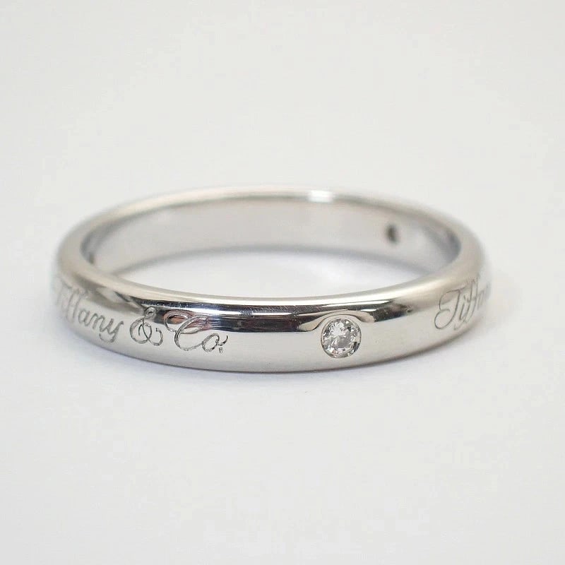 TIFFANY & CO. PT950 LUCIDA NOTES BAND RING: Tiffany & Co. Pt950 Lucida Notes Band Ring Brand: Tiffany & Co. Type/Style: Ring Material: Pt950, Main Stone Natural Color: Silver Size: US 5.5 Accessories: None Accessories Notice: When purchasing