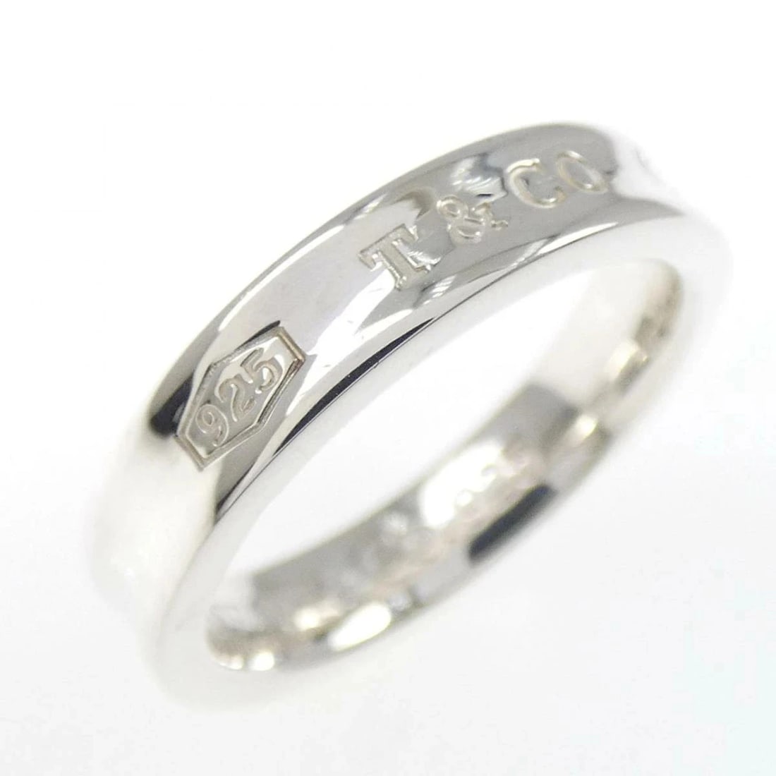 TIFFANY NARROW RING 925 SILVER: Tiffany Narrow Ring 925 Silver Brand: Tiffany & Co. Type/Style: Ring Material: 925 Sterling Silver, Color: SV Size: US 5 Accessories: None Accessories Notice: When purchasing pre-owned goods, please