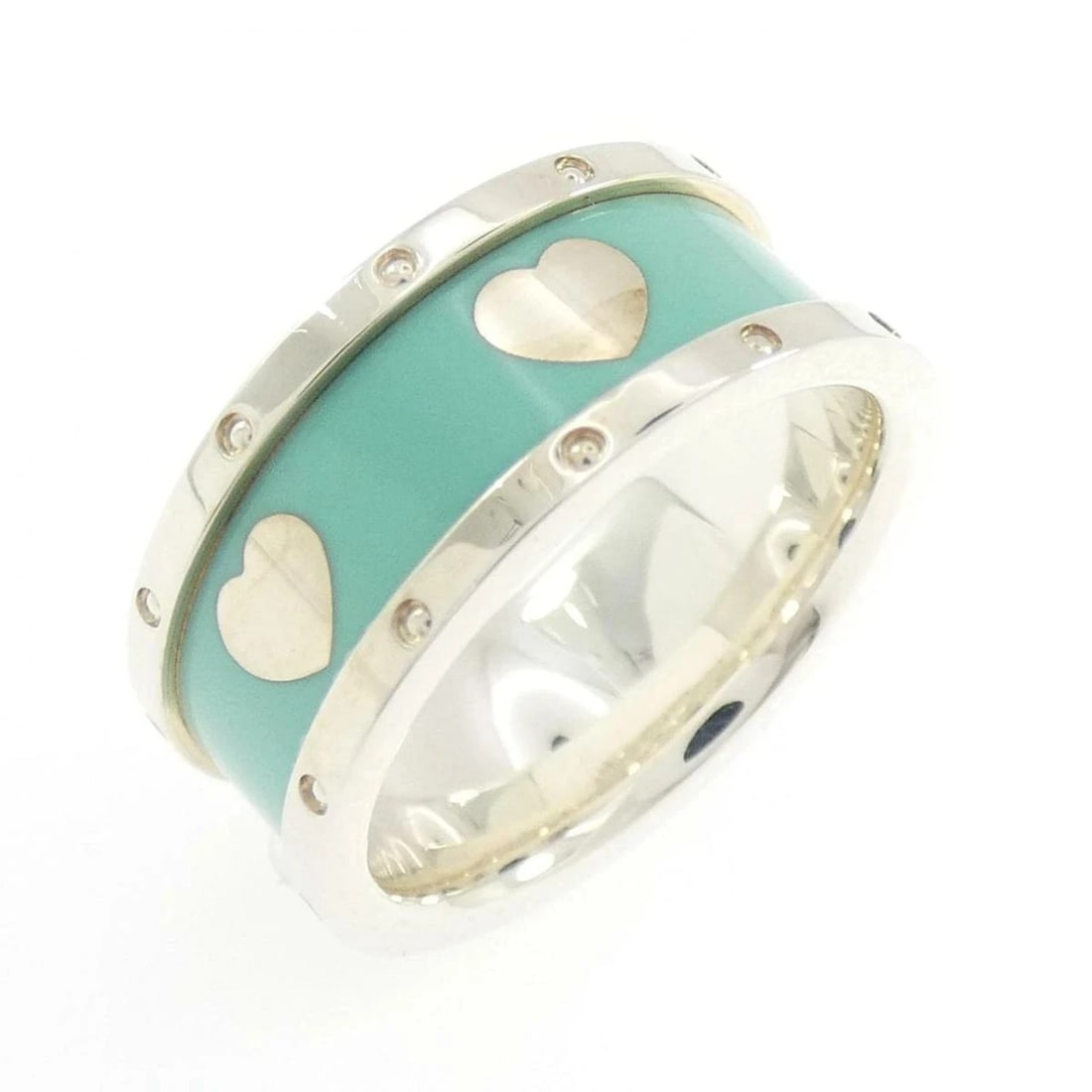 TIFFANY 925 SILVER RING RESIN STONE POLISHED: Tiffany 925 Silver Ring Resin Stone Polished Brand: Tiffany & Co. Type/Style: Ring Material: 925 Sterling Silver, Main Stone Resin Color: Silver Size: US 6.5 Accessories: None Accessories