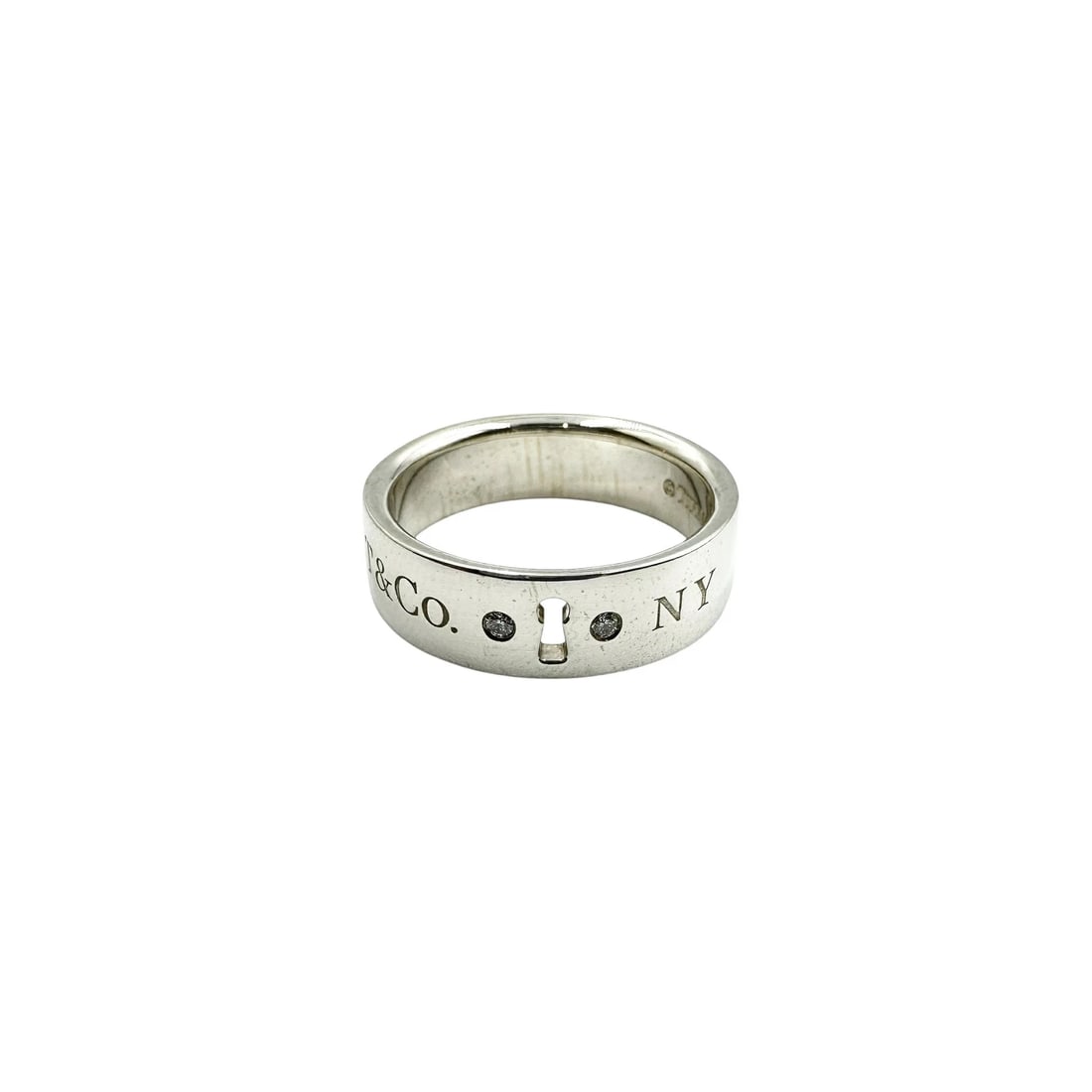 TIFFANY & CO. NY LOCK 2P DIAMOND SILVER RING: Tiffany & Co. NY Lock 2P Diamond Silver Ring Brand: Tiffany & Co. Type/Style: Ring Material: 925 Sterling Silver, Color: Silver Size: US 7.5 Accessories: None Accessories Notice: When purc