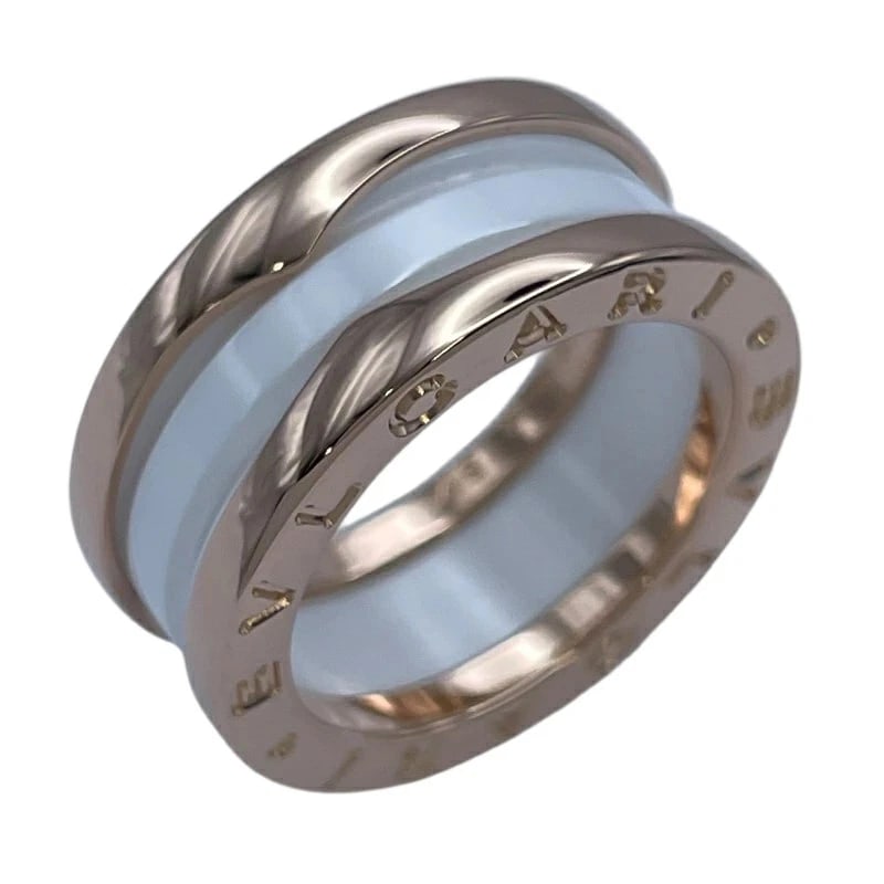 BVLGARI B.ZERO1 3-BAND RING PINK GOLD: BVLGARI B.Zero1 3-Band Ring Pink Gold Brand: Bvlgari Type/Style: Ring Material: 18K Pink Gold with White, Color: Pink Gold Size: US 4.75 Accessories: None Accessories Notice: When purchasi