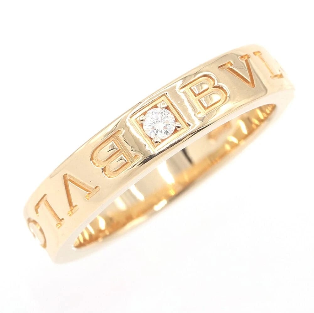 BVLGARI DOUBLE LOGO RING 1 DIAMOND 18K YELLOW GOLD: Bvlgari Double Logo Ring 1 Diamond 18K Yellow Gold Brand: Bvlgari Type/Style: Ring Material: 18K Yellow Gold, Main Stone Natural Color: Yellow Gold Size: US 6.5 Accessories: None Accessories Notice: