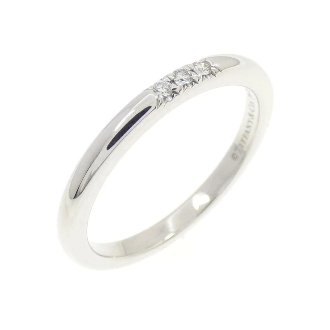 TIFFANY PLATINUM 950 BAND RING WITH DIAMOND: Tiffany Platinum 950 Band Ring with Diamond Brand: Tiffany & Co. Type/Style: Ring Material: Pt950, Main Stone Natural Color: Silver Size: US 5 Accessories: None Accessories Notice: When purchasing
