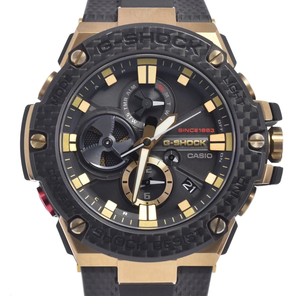 CASIO G-SHOCK G-STEEL SOLAR WATCH: Casio G-Shock G-Steel Solar Watch Brand: CASIO Type/Style: Wristwatch Material: Band Material resin, Case Material Carbon / Stainless Steel Color: Case Color Black / gold, Band Color Black / red,