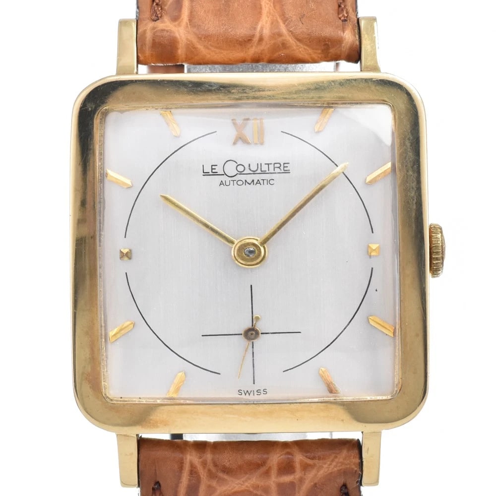 JAEGER-LECOULTRE SMALL AUTOMATIC WATCH: Jaeger-Lecoultre Small Automatic Watch Brand: JAEGER-LECOULTRE Type/Style: Wristwatch Material: Band Material leather, Case Material K14YG Color: Case Color gold, Band Color Brown, Dial Color Silver