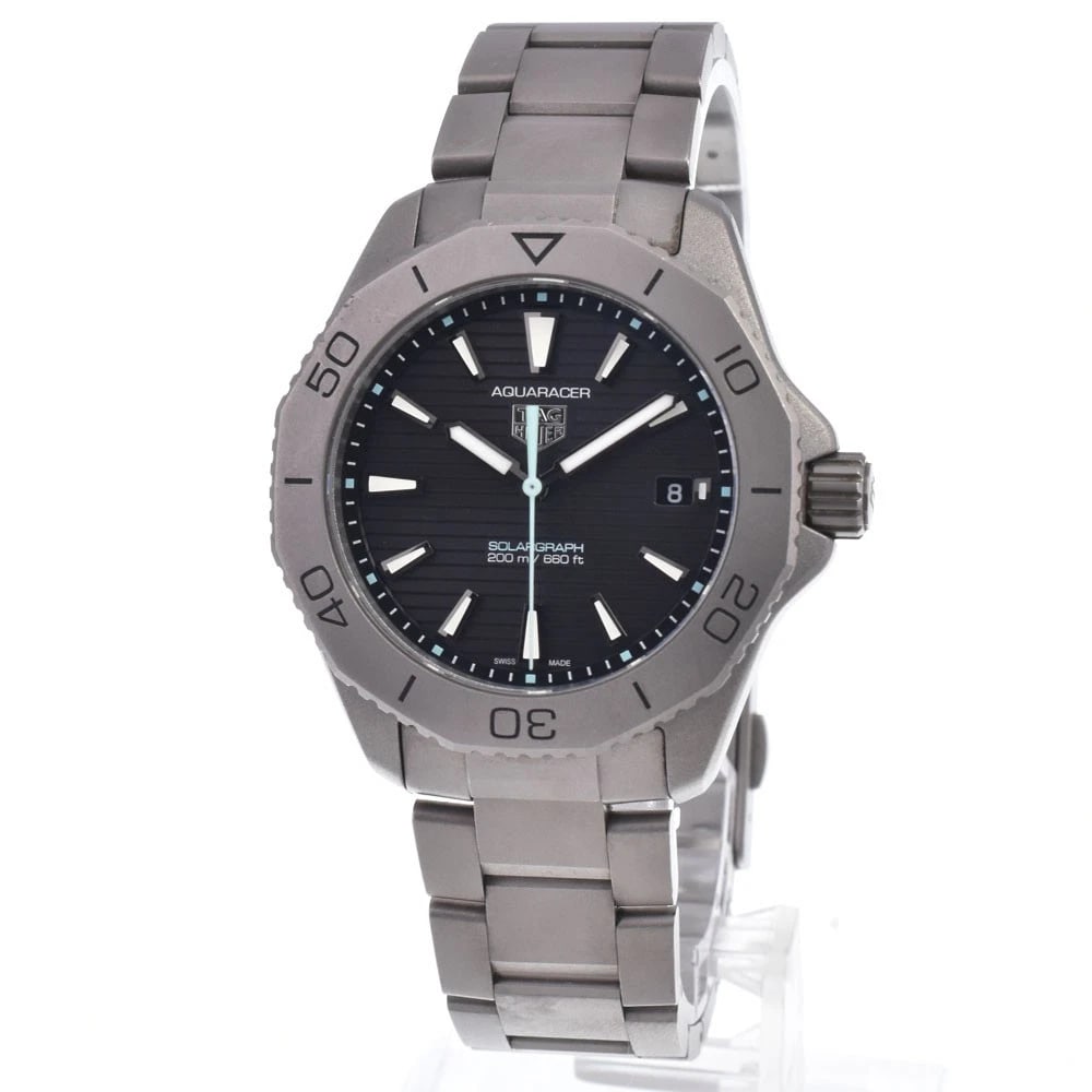 TAG HEUER AQUA RACER PROFESSIONAL WATCH: Tag Heuer Aqua Racer Professional Watch Brand: TAG HEUER Type/Style: Wristwatch Material: Band Material titanium, Case Material titanium Color: Case Color Silver, Band Color Silver, Dial Color black S