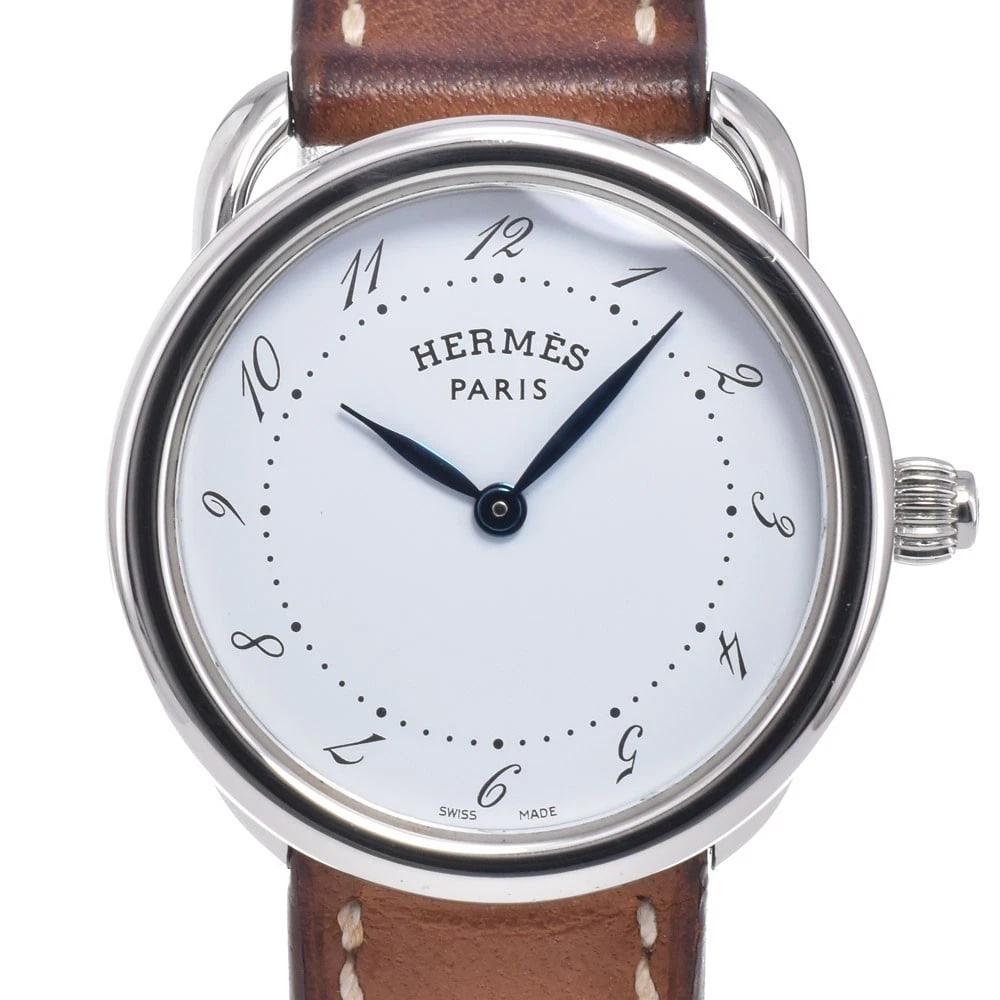 HERMES ARCEAU WHITE DIAL QUARTZ WATCH: Hermes Arceau White Dial Quartz Watch Brand: HERMES Type/Style: Wristwatch Material: Band Material leather, Case Material Stainless Steel Color: Case Color Silver, Band Color Brown, Dial Color white