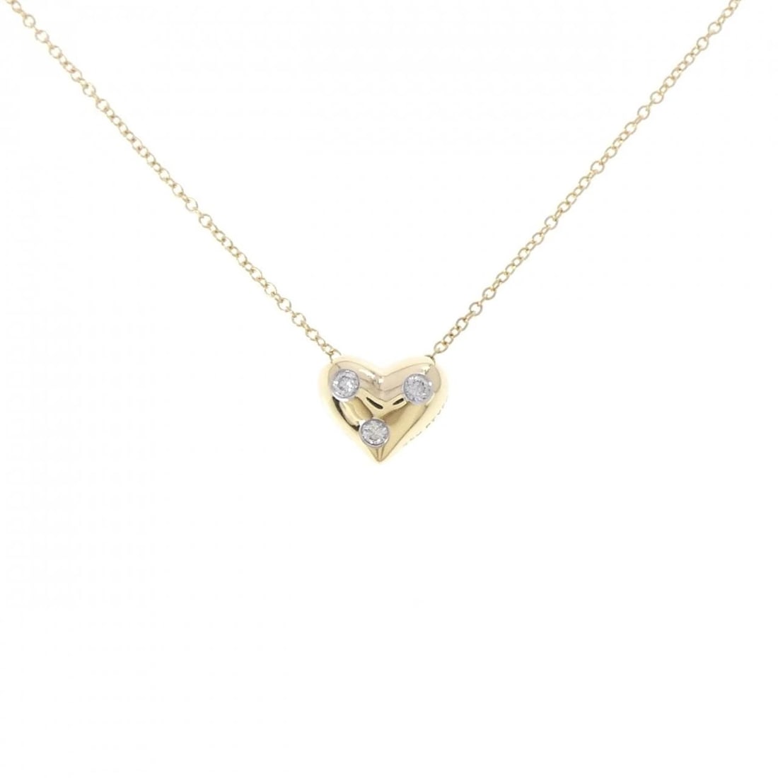 TIFFANY & CO. DOTS PINCHED HEART NECKLACE: TIFFANY & Co. Dots Pinched Heart Necklace Brand: TIFFANY&Co. Type/Style: TIFFANY&Co. Necklace Material: 750 Yellow Gold/Platinum 950, Main Stone Natural Color: YG,Silver Size: Length41cmActual Size Pe