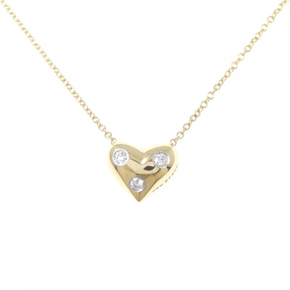 TIFFANY & CO. DOTS PINCHED HEART NECKLACE: TIFFANY & Co. Dots Pinched Heart Necklace Brand: TIFFANY&Co. Type/Style: TIFFANY&Co. Necklace Material: 750 Yellow Gold/Platinum 950, Main Stone Natural Color: YG,Silver Size: Length41cmActual SizePen