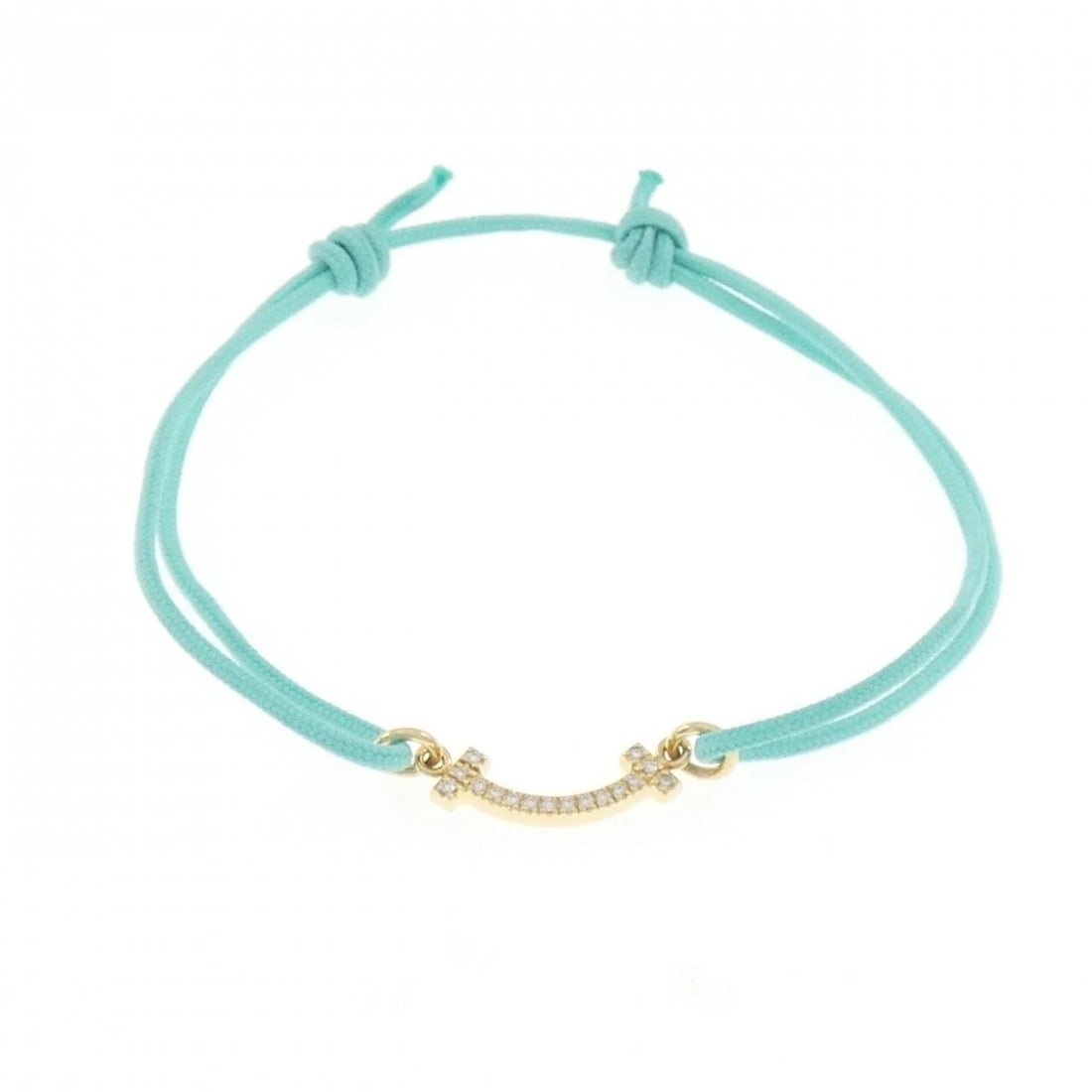 TIFFANY & CO. T SMILE BRACELET: TIFFANY & Co. T Smile Bracelet Brand: TIFFANY&Co. Type/Style: TIFFANY & Co. Bracelet Material: 750 yellow gold, Main Stone Natural Color: YELLOW GOLD Size: Actual Size Max width approx: 3.7mm
