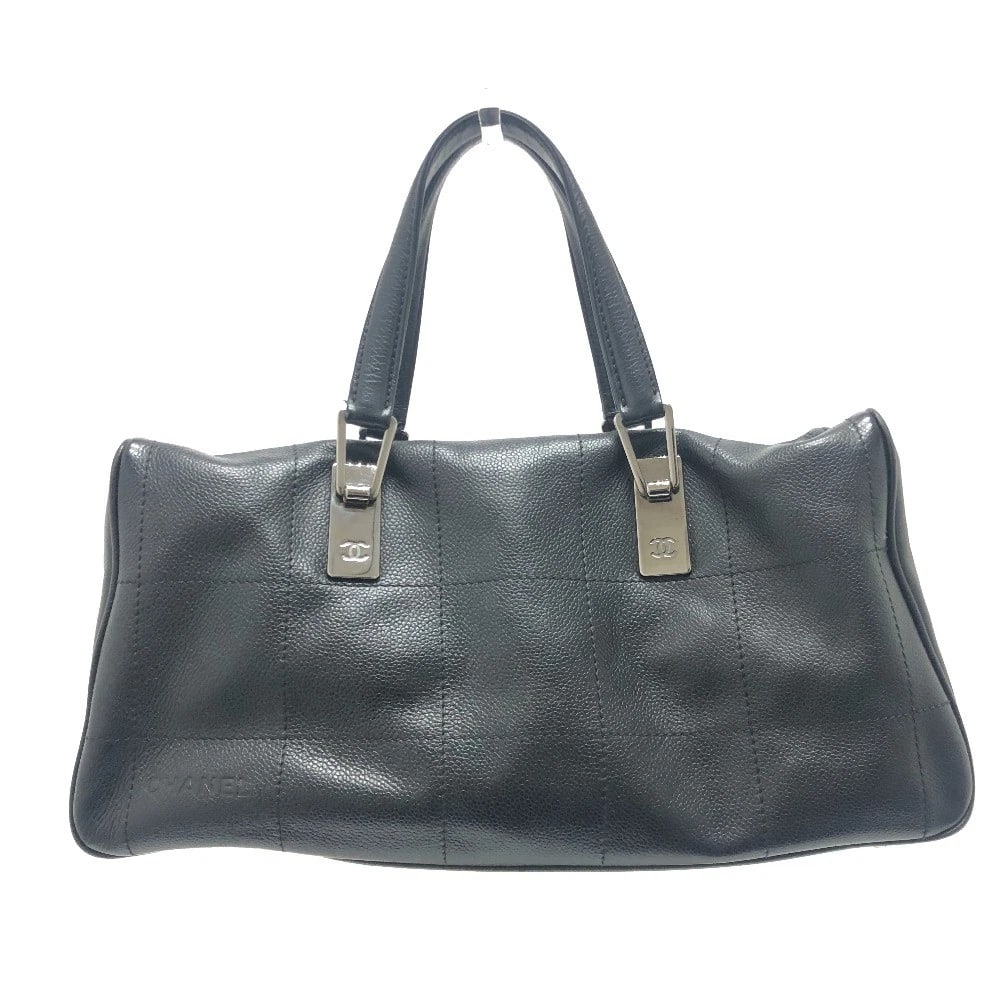 CHANEL CHOCOLATE BAR HANDBAG SOFT CAVIAR LEATHER: CHANEL Chocolate bar Handbag Soft Caviar Leather Brand: CHANEL Type/Style: Duffle Bag Material: Soft Caviar Leather Color: BlackxSilverHardware Size: W14.0xH6.9xD4.1inch / W35.5cmxH17.5cmxD10.5cm