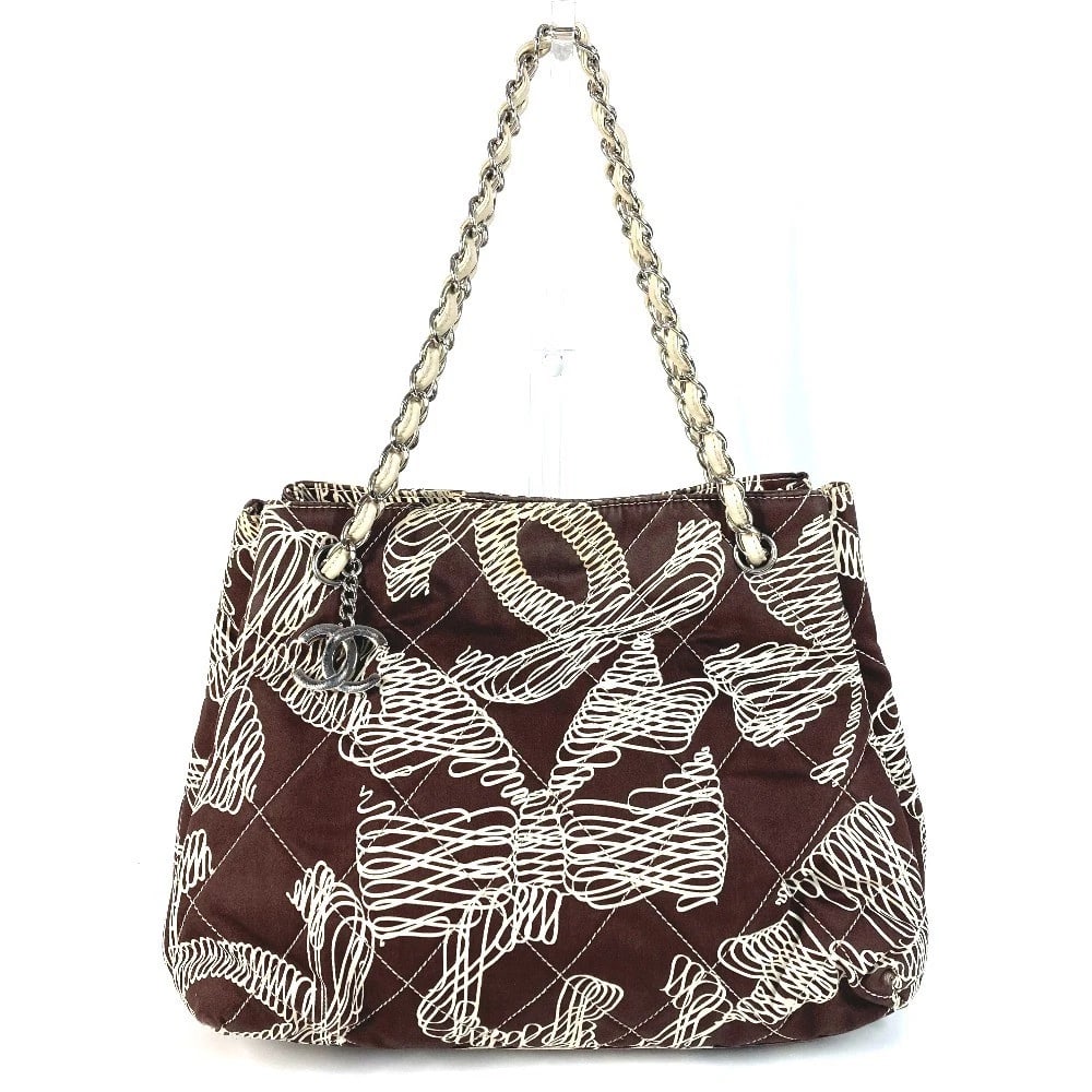 CHANEL MARK LOGO QUILTED TOTE BAG SHOULDER BAG: CHANEL Mark Logo Quilted Tote Bag Shoulder Bag Brand: CHANEL Type/Style: Shoulder Bag Material: Canvas Color: BrownxBeigeBased Size: W12.4xH9.1xD7.9inch / W31.5cmxH23cmxD20cm Accessories: None
