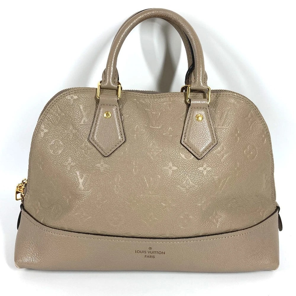 LOUIS VUITTON MONOGRAMEMPREINTE NEO ALMA: LOUIS VUITTON MonogramEmpreinte Neo Alma Brand: Louis Vuitton Type/Style: Hand Bag Material: MonogramEmpreinteLeather Color: Tour rail / Beige Size: W12.6xH8.7xD5.1inch / W32cmxH22cmxD13cm
