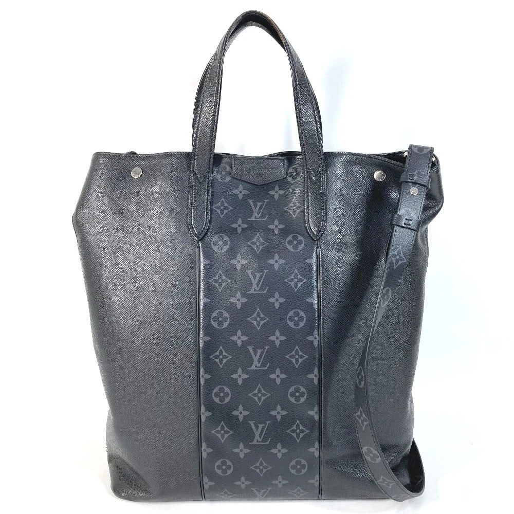 LOUIS VUITTON TAIGALAMA CITY HAND BAG: LOUIS VUITTON Taigalama City Hand Bag Brand: LOUIS VUITTON Type/Style: Tote Bag Material: Taiga Leather / MonogramEclipseCanvas Color: Black Size: W13.6xH15.6xD5.5inch / W34.5cmxH39.5cmxD14cm Acce