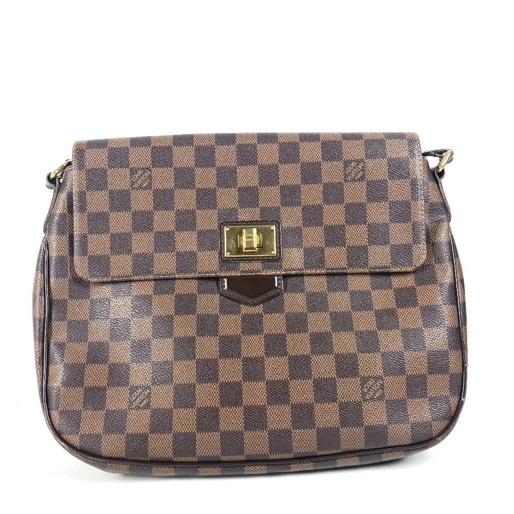 LOUIS VUITTON DAMIER BUZASLOWSBURY CROSSBODY: LOUIS VUITTON Damier Buzaslowsbury Crossbody Brand: LOUIS VUITTON Type/Style: Shoulder Bag Material: Damier Canvas Color: Ebene / Brown Size: W11.8xH9.3xD4.5inch / W30cmxH23.5cmxD11.5cm Accessorie